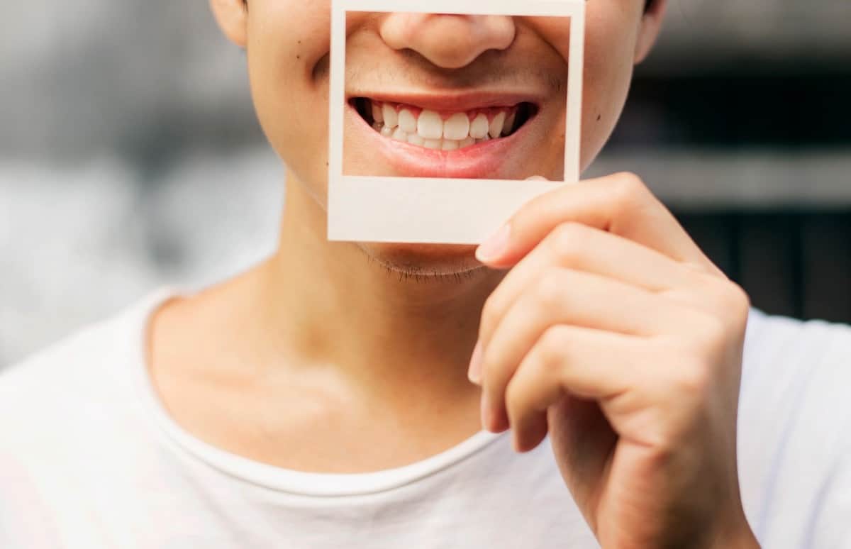 Smiling man showing personality for youtube